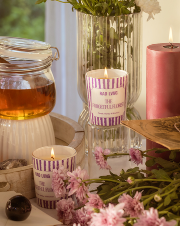 The Forgetful Florist 100g scented candle in elegant glass jar with floral honey bourbon notes