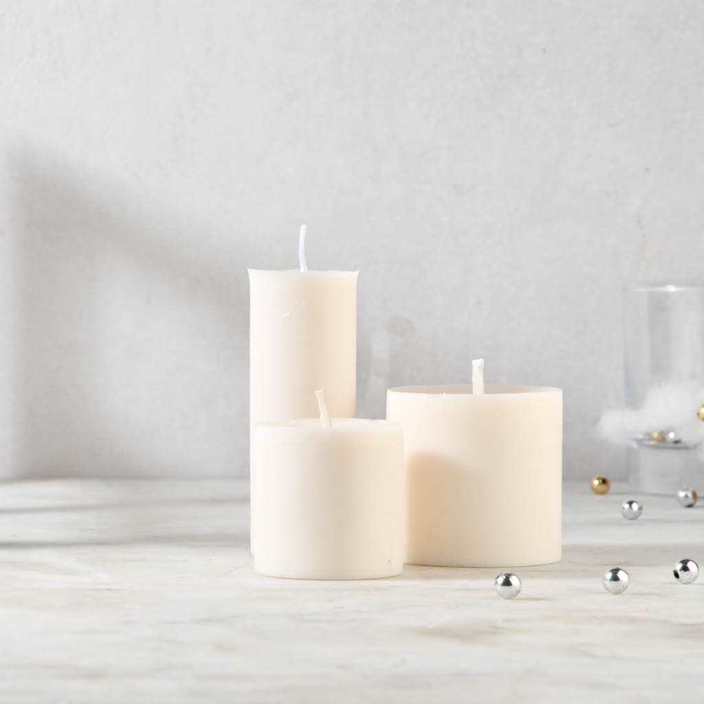 Christmas Corner - Set of 4 Pillar Candles - Cinnamon Roll Scented