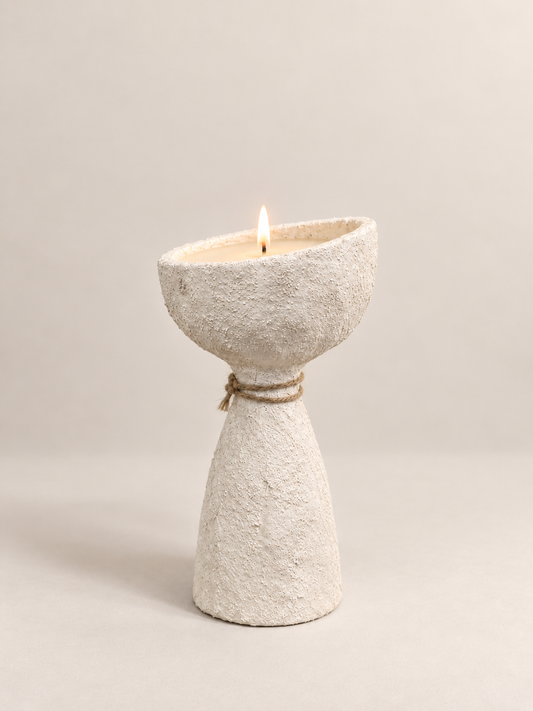 The Mashaal tall candle by RAD LVNG, Temple Petals scented, in a tall cement vessel